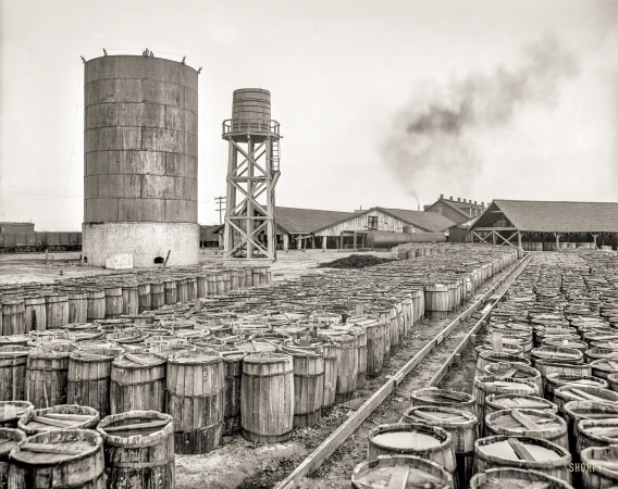 Photo showing: Tank and Barrel -- 1903. Plant of the Consolidated Naval Stores Company, Pensacola, Florida.
