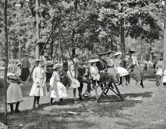 Photo showing: Teeter-Totter Attire -- Detroit circa 1903. Children's playground, Belle Isle Park.