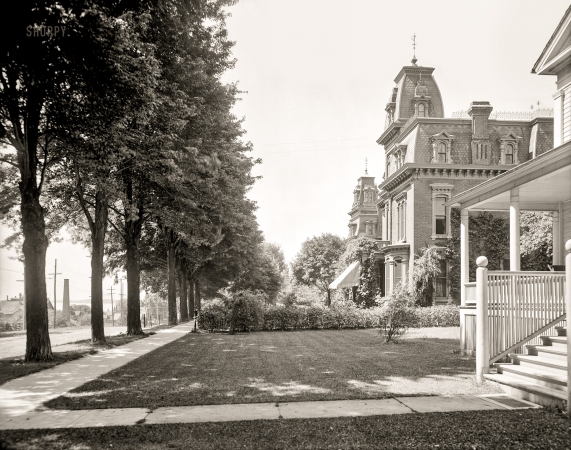 Photo showing: Mansard Family Values -- St. Clair, Michigan, circa 1905. Residences on Front Street.