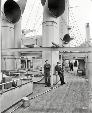 Photo showing: Spar Deck Swabbies -- Circa 1898. League Island Navy Yard, Philadelphia. U.S.S. Brooklyn spar deck.