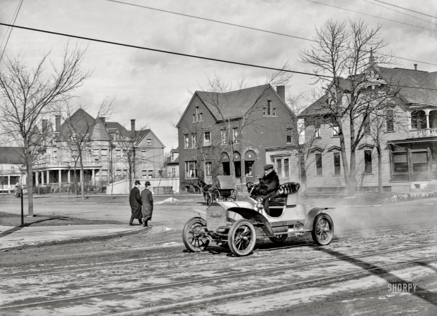 Photo showing: The Automobilist -- Detroit circa 1910. Automobile on Jefferson Avenue at East Grand Boulevard.