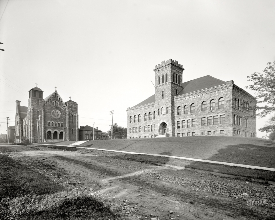 Photo showing: Baraga School -- Marquette, Michigan, circa 1905. Baraga School and St. Peter's Cathedral.