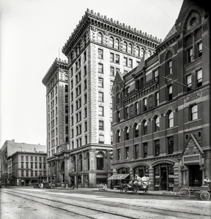 Photo showing: Empty Barrels -- Syracuse, New York, circa 1910. University Block, East Washington Street.