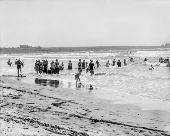 Photo showing: The Rope Line -- Circa 1904. Surf bathing at Easton's Beach, Newport, R.I.