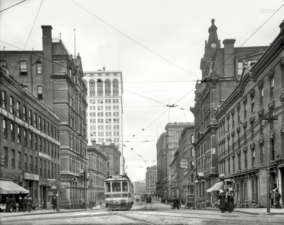 Photo showing: Teddy the Tailor -- Detroit circa 1910. Griswold Street looking toward Ford Building.