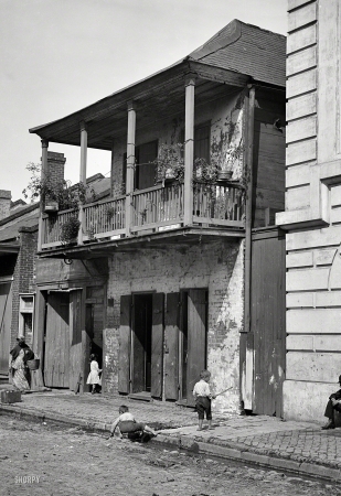 Photo showing: Old Orleans -- New Orleans circa 1880s-1890s. Street in the French Quarter.