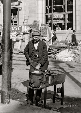 Photo showing: Toasty Nuts -- 1905. A chestnut vender -- Baltimore, Md.