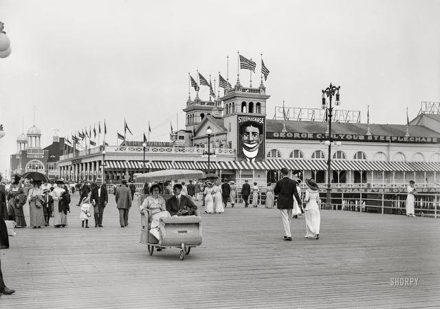Photo showing: The Funny Place -- Atlantic City circa 1912. The Boardwalk and Steeplechase Pier.