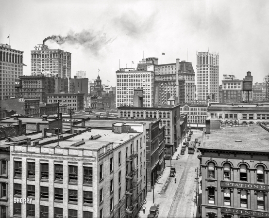 Photo showing: Sootyscape II -- Detroit circa 1918. Sky scrapers from interurban station, Jefferson Avenue at Bates Street.