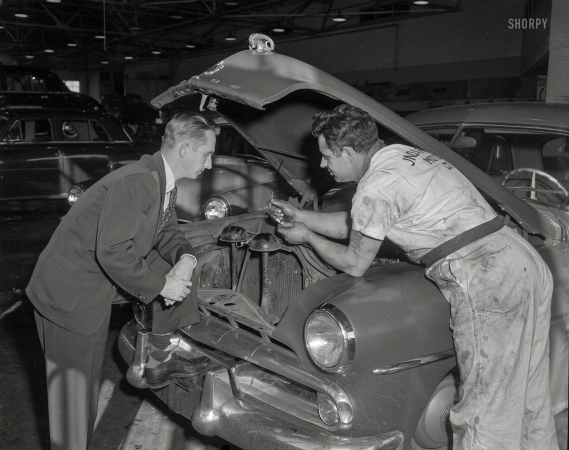 Photo showing: Problem Solved -- Columbus, Georgia, circa 1952. Pope Motor Co. service garage.