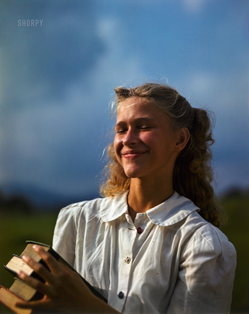 Photo showing: Golden Girl III -- September 1947. New England characters -- girl with books.