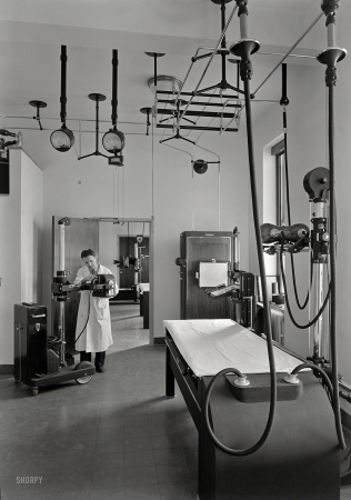 Photo showing: X - Man -- Jan. 11, 1941. Triboro Hospital for Tuberculosis, Parsons Boulevard, Jamaica, New York. Fluoroscopy room with technician.