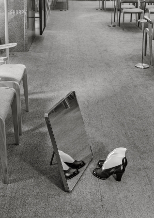 Photo showing: Footloose -- -- July 28, 1946. Florsheim Shoes, 516 Fifth Avenue, New York City. Mirror detail.