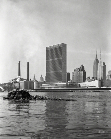 Photo showing: United Nations -- March 18, 1952. United Nations Secretariat and General Assembly from Welfare Island.