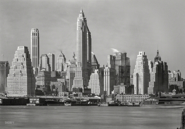 Photo showing: Fantasy Island -- April 4, 1932. New York city views. Lower Manhattan from foot of Brooklyn Bridge.