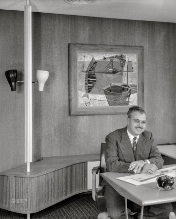 Photo showing: Mad Man -- Nov. 16, 1950. Raymond Loewy Associates, 488 Madison Ave., New York. Mr. Snaith at his desk.