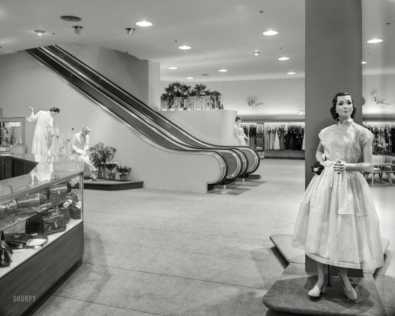 Photo showing: Junior Miss Fashions -- February 16, 1951. Hahne & Co. department store in Montclair, New Jersey. Toward escalator.