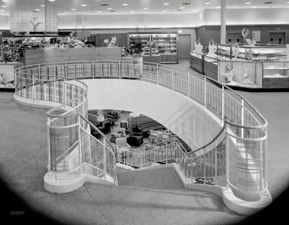 Photo showing: Ladies Furnishings -- May 17, 1951. John Wanamaker, Great Neck, Long Island. Staircase I.