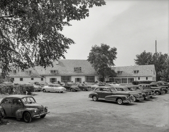 Photo showing: Candlelight Parking -- May 26, 1951. Patricia Murphy's Candlelight Restaurant, Manhasset, Long Island, New York. Exterior, with autos.