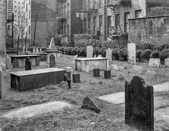 Photo showing: A Quiet Neighborhood -- Nov. 7, 1952. New York City views. Old cemetery No. 1, Shearith Israel, Old Bowery or St. James Place.