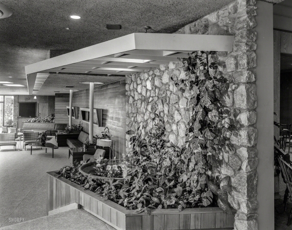 Photo showing: Leafy Lobby -- August 13, 1957. Tamarack Lodge, Greenfield Park, New York. Lobby to fountain.