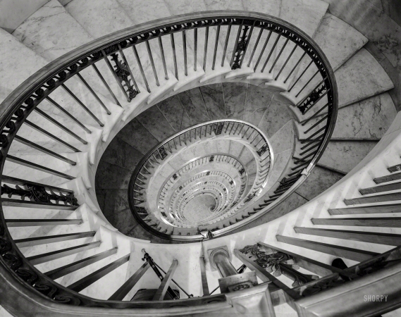 Photo showing: Downward Spiral -- Washington, D.C., circa 1936. U.S. Supreme Court interiors. Stairwell looking down. 