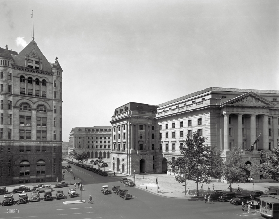 Photo showing: Federal Triangle -- Washington, D.C., circa 1935. Old Post Office Building (far left) and new Post Office Department.