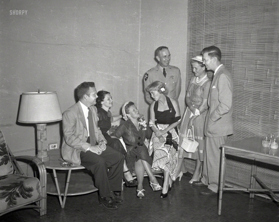 Photo showing: The Reception: 1958 -- Columbus, Georgia, circa 1958. Reception. A mix of civilian bamboo and Army brass.