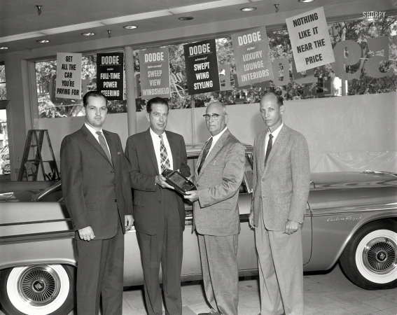 Photo showing: Dodge Custom Royal -- Columbus, Georgia, Dodge dealers in their showroom with a 1958 model.