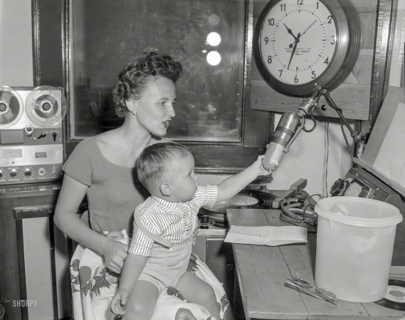Photo showing: WMOM -- Columbus, Georgia, 1950s. A lady and a baby with a bent for broadcasting.