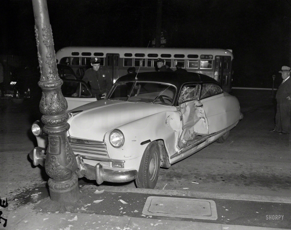 Photo showing: Smash, Hit -- Oakland, Calif., circa 1957. Hudson meets lamppost after being hit broadside.