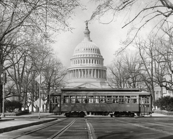 Photo showing: D.C. Transit -- March 12, 1961. D.C. Transit trolley in front of the U.S. Capitol.
