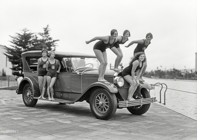 Photo showing: A Pretty Grille. -- San Francisco circa 1927. Cadillac and swimmers at Fleishhacker Pool.