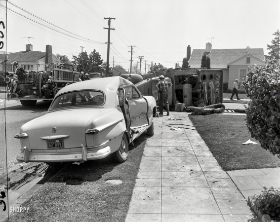 Photo showing: David and Goliath -- Oakland circa 1958, with a Ford punching above its weight.