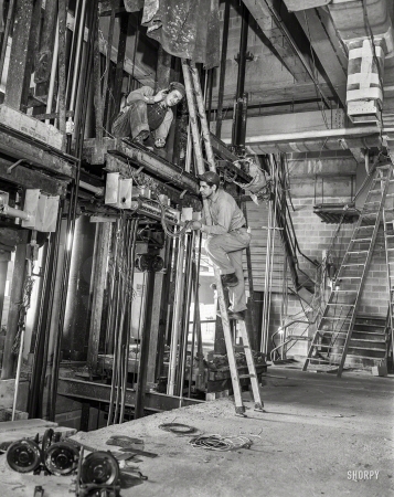 Photo showing: Shaft -- Chicago circa 1955. Elevator engineers.