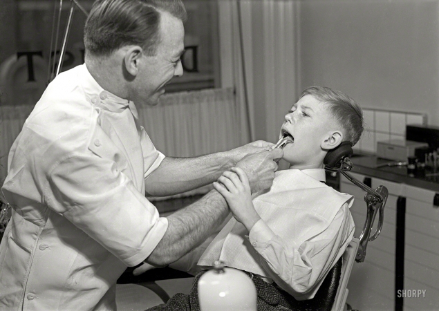 Photo showing: Appointment With Dentistry -- Circa 1950. Dental office.