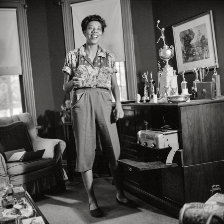 Photo showing: Althea Gibson -- September 1957. New York. Tennis champion Althea Gibson at her home in Harlem.
