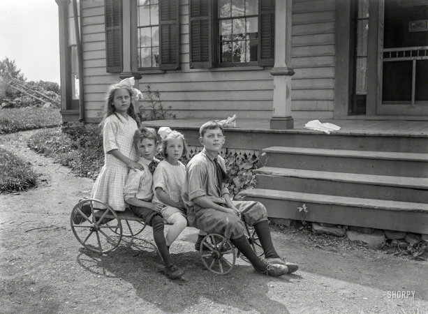 Photo showing: On the Wagon -- From circa 1900 somewhere in the Northeast, four anonymous young people.