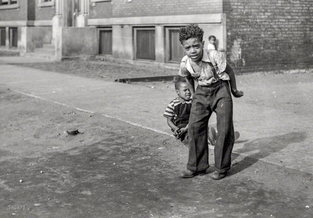 Photo showing: Social Study -- April 1941. Children playing on the street. Chicago, Illinois.