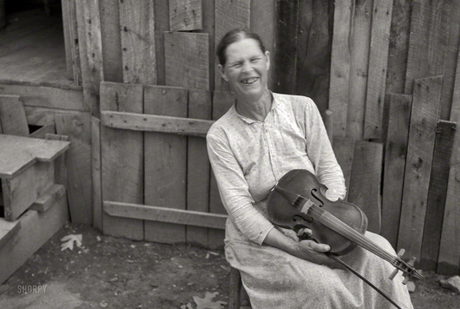 Photo showing: The Merry Fiddler -- 1937. Mrs. Mary McLean, Skyline Farms, Alabama.