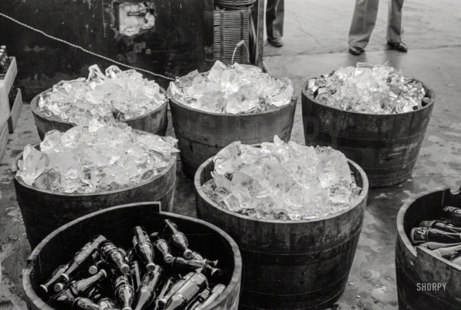 Photo showing: Cold Drinks -- October 1938. Ice at refreshment stand, state fair, Donaldsonville, Louisiana.