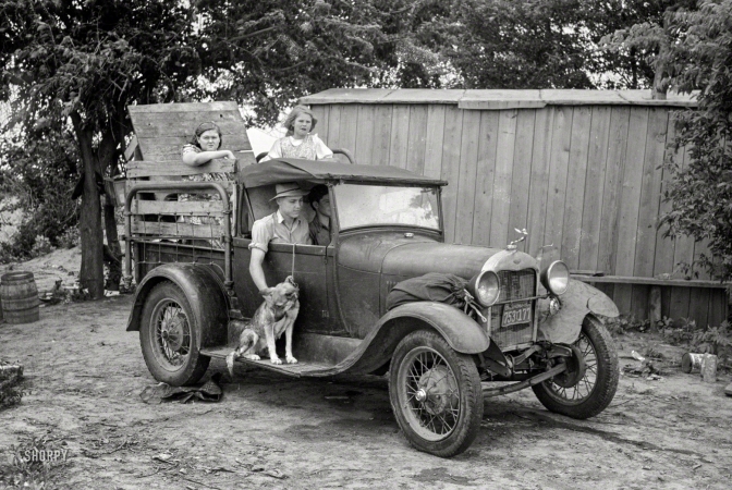 Photo showing: California Here We Come -- July 1939 near Muskogee, Oklahoma. Migrant family ready to depart for the journey to California.
