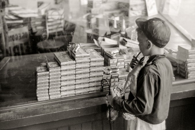 Photo showing: Desperado -- July 1941. Store with cap guns and fireworks for sale, Fourth of July, Vale, Oregon.