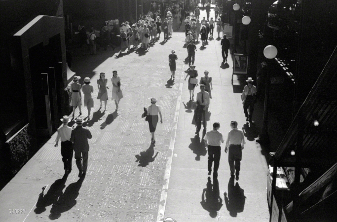 Photo showing: Five OClock Shadows -- July 1941. Five o'clock crowds, Chicago.