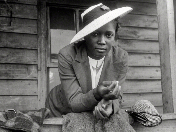 Photo showing: Southern Style -- July 1940. Migratory agricultural worker from Florida.
It is Sunday and she is wearing her best clothes. 