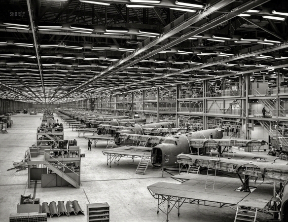 Photo showing: The Wings of War -- October 1942. The Consolidated Aircraft plant in Fort Worth, Texas. Production of B-24 bombers and C-87 transports.