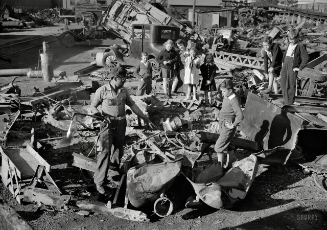 Photo showing: Field Trip. -- October 1942. Young fighters in Uncle Sam's junior army visit a scrap yard in Roanoke,
Virginia, to see for themselves what happens to the scrap they collect for our war industries.