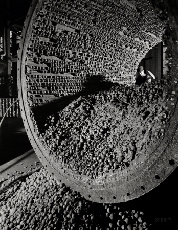 Photo showing: Balls of Iron -- November 1942. Utah Copper Co. -- Interior of large ball mill showing the iron balls which grind the ore to a fine size.