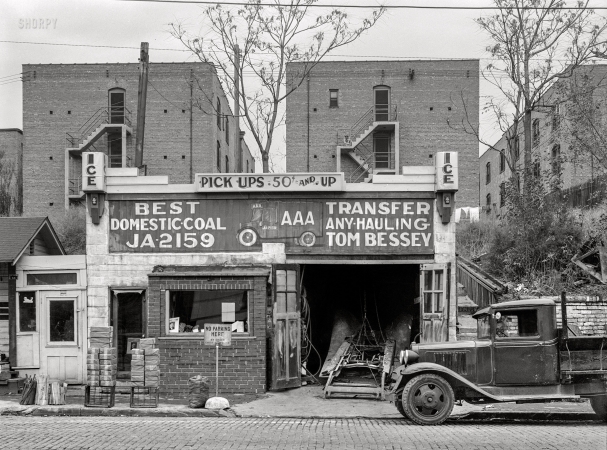 Photo showing: Best Domestic Coal -- November 1938. Apartment houses with no rear windows. Omaha, Nebraska.