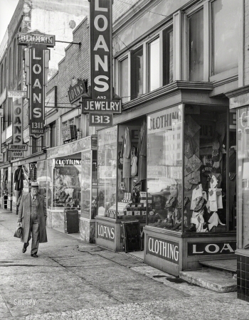 Photo showing: Loan Ranger -- November 1938. Loan companies on lower Douglas Street. Omaha, Nebraska.